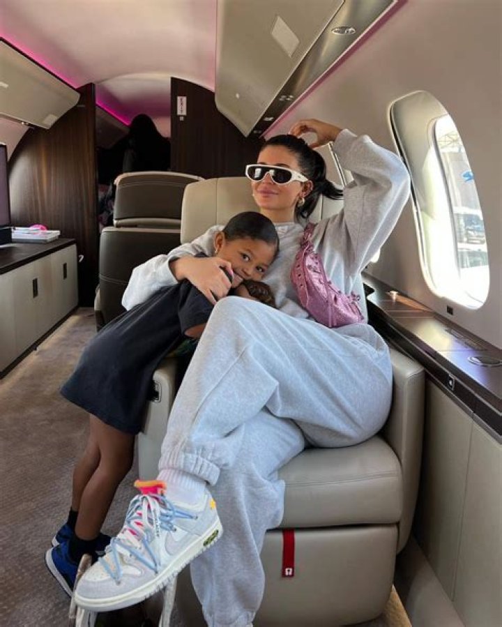 Kylie Jenner Cuddles With Stormi, 5, & Aire, 1, In Photos From Their Private Jet ‘Adventures’