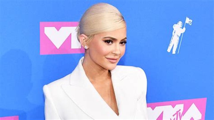 Kylie Jenner Jokes She’s The ‘Cool Aunt’ While Holding Psalm West, 1, In Cute New Pics