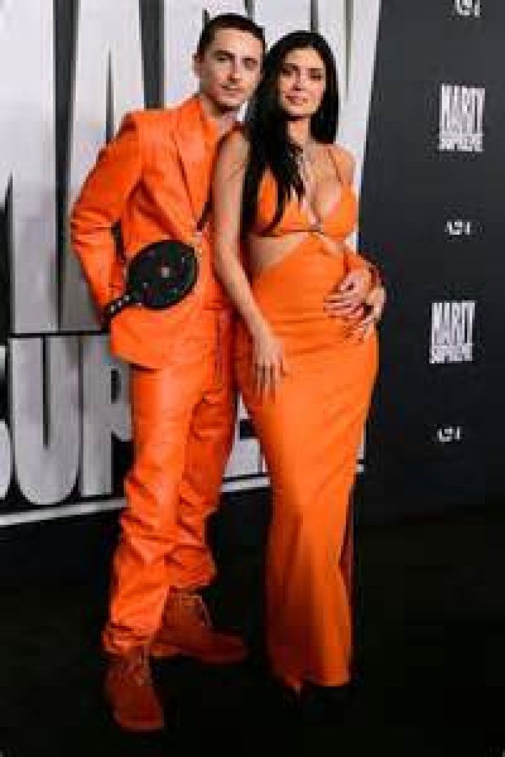 Kylie Jenner Goes Makeup-Free & Runs Errands In Bright Orange Sweatsuit — See Pic