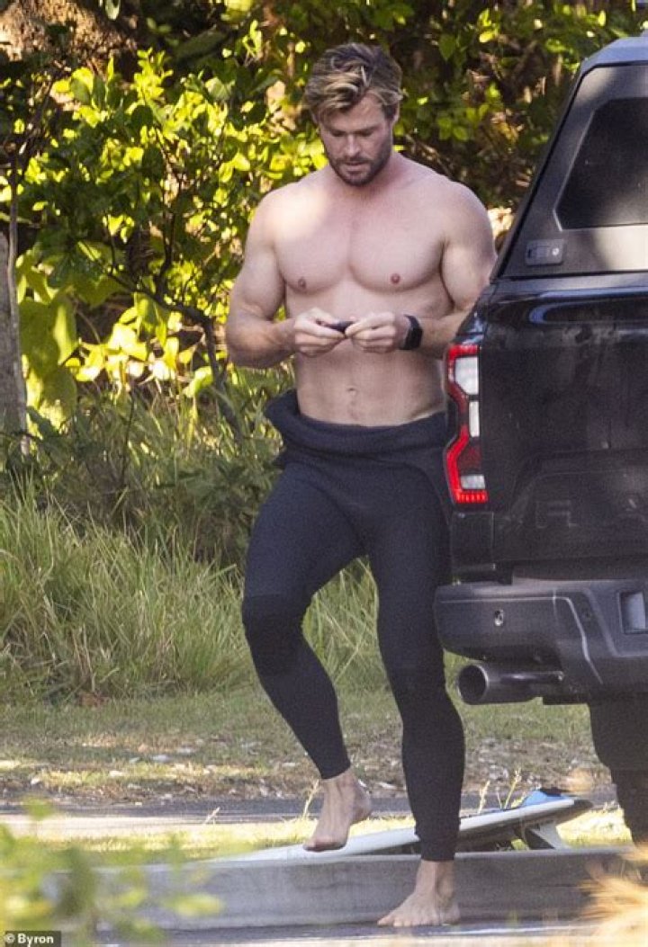 Liam Hemsworth Puts Abs & Bulge On Display In Teeny Tiny Speedo & We’re Drooling