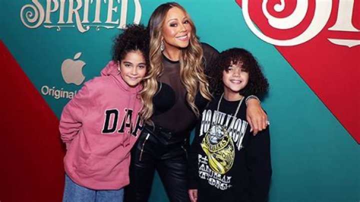 Mariah Carey Is Festive In Plaid Dress For Boxing Day With Twins, 11, & Bryan Tanaka