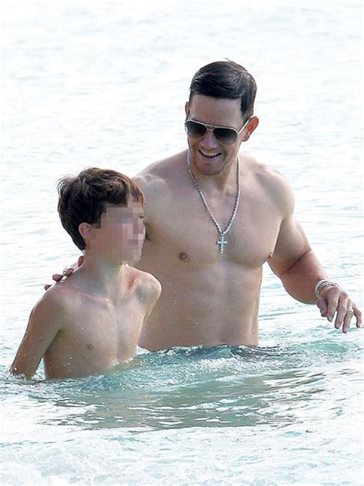 Mark Wahlberg, 48, Shows Off Rock-Hard Abs While Goofing Around In The Ocean With Son Brendan, 11