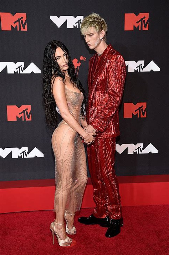 Megan Fox Wears Nude, Sheer Dress To The VMAs While Holding Hands With MGK — See Pics