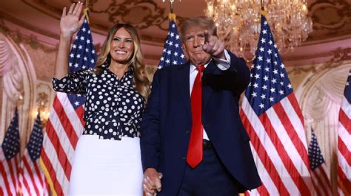 Melania Trump Looks Terrified Holding Hands With Donald Trump While Wearing $1,140 Blue Dress — Pic
