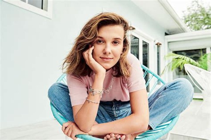 Millie Bobby Brown Rocks White Bra Top & Blue Jeans In Sexy New Photo – Hollywood Life