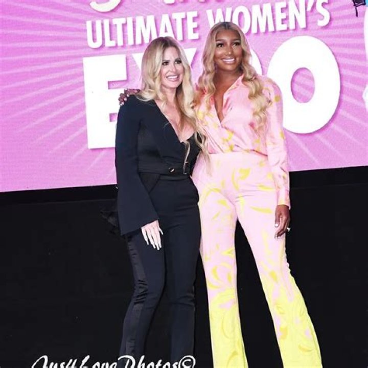 ‘RHOA’s Nene Leakes & Kim Zolciak Hug As They Reunite At Atlanta Women’s Expo — Watch