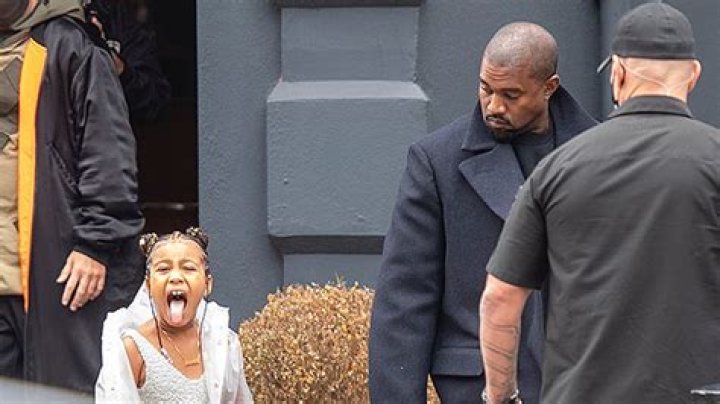 North West Sticks Her Tongue Out At Photographers With Dad Kanye West – Hollywood Life