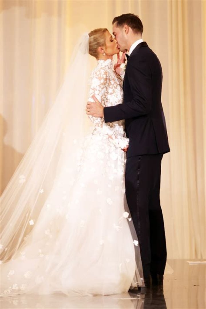 Paris Hilton & Carter Reum Look Madly In Love In First Photo As Husband & Wife