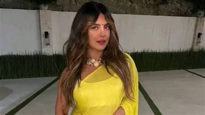 Priyanka Chopra Rocks Yellow Swimsuit & Nick Jonas Can Only Say ‘Damn’ – Hollywood Life
