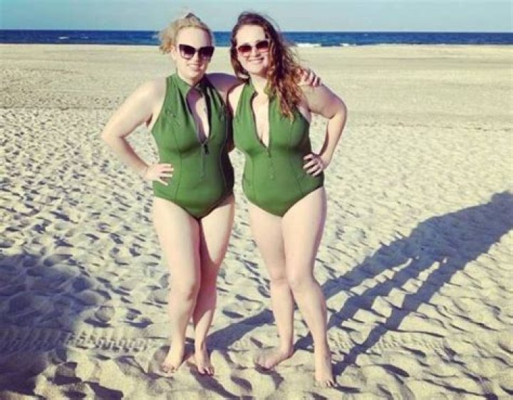 Rebel Wilson, 40, Looks Incredible In Plunging Green Swimsuit After 50 Lb. Weight Loss — Pic