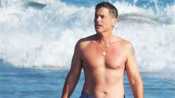 Rob Lowe, 56, Walks Shirtless On The Beach Ahead Of Highly-Anticipated ‘West Wing’ Reunion — Pic