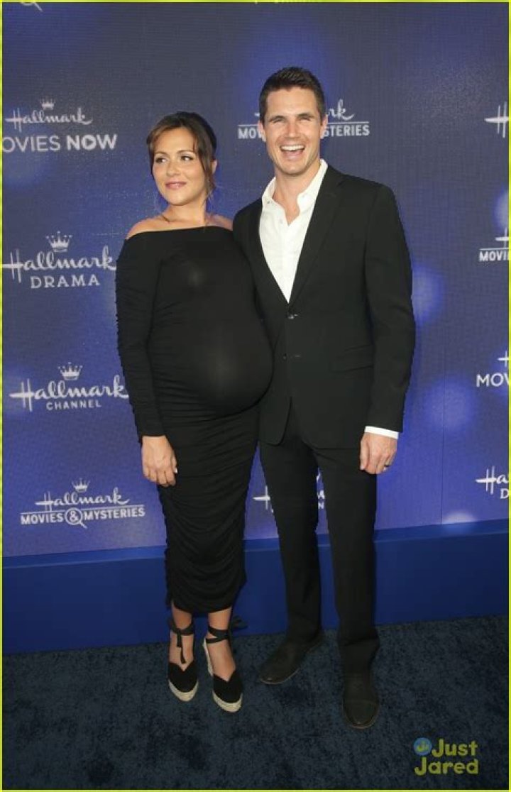 Robbie Amell & Italia Ricci Expecting 1st Child Together: See Her Huge Bump In Hilarious Pic