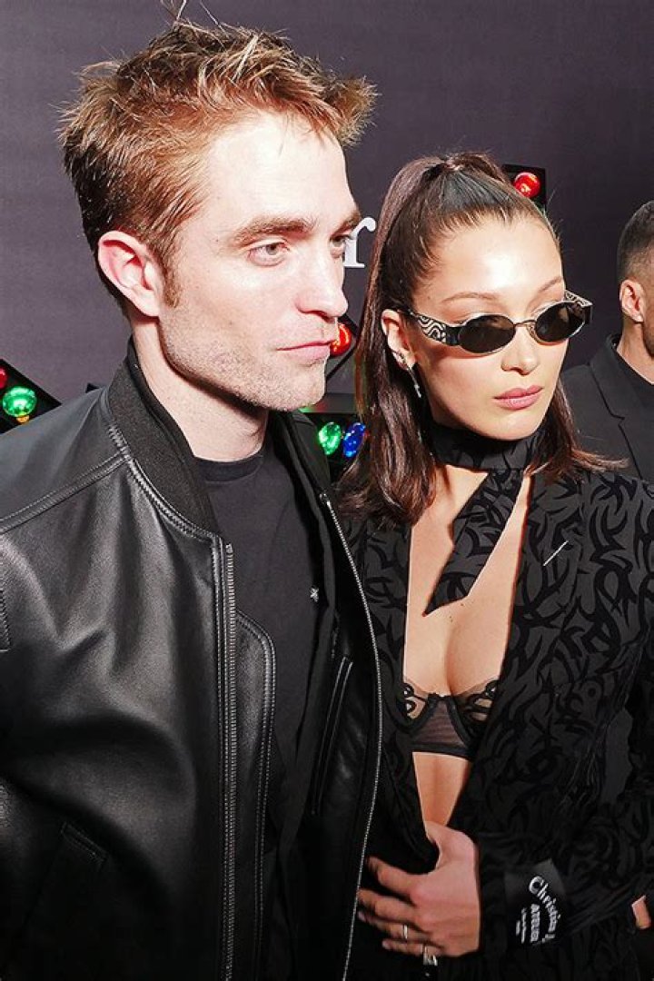 Robert Pattison Cozies Up To Bella Hadid At Paris Dior Show — See Hot Pic