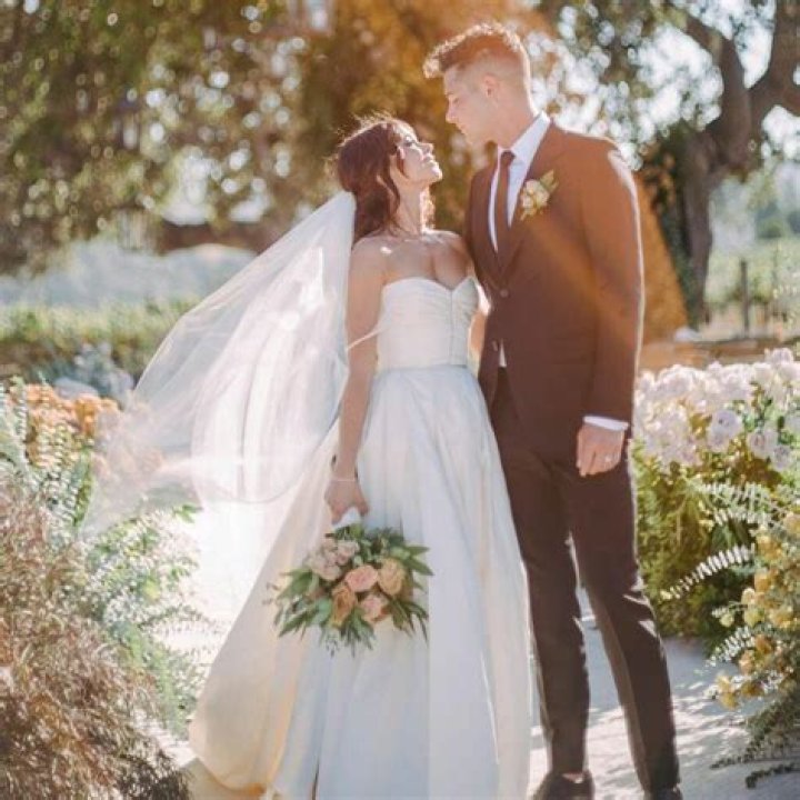 Sarah Hyland Stuns In Bridal White While Celebrating Would-Be Wedding Day With Wells Adams