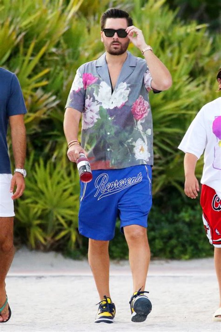 Scott Disick Escapes To The Beach As Kourtney Marries Travis In Italy