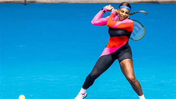 Serena Williams Stuns In One-Legged Pink & Red Catsuit At Australian Open