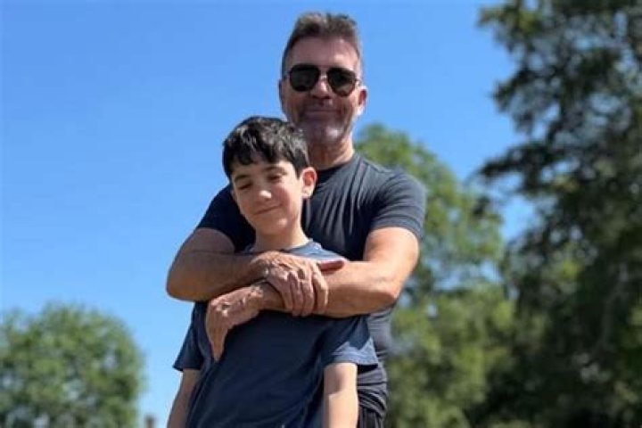 Simon Cowell, 60, Looks Buff As He Goes Shirtless On The Beach With Son Eric, 7, & Lauren Silverman