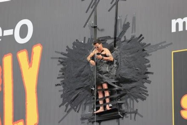 Steve-O Duct Tapes Himself To A Billboard & Assures Fans There’s ‘Zero Chance’ That He’ll Fall