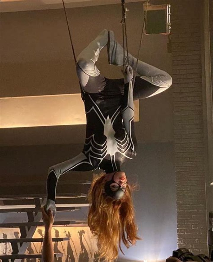 Sydney Sweeney Hangs Upside Down While Rocking Spider-Woman Costume in ‘Madame Web’ BTS Photos