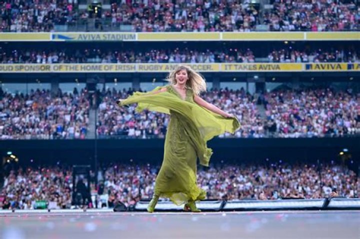 Taylor Swift Smiles Wide as She Spots Travis Kelce in the Crowd at Dublin Concert: Watch
