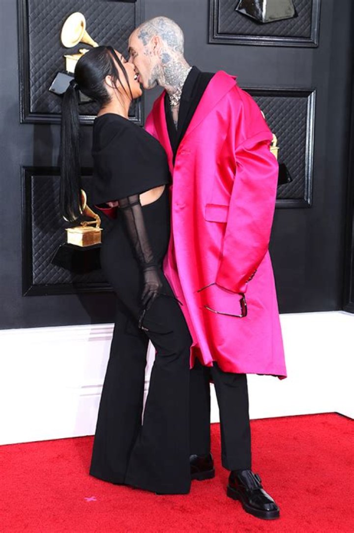 Travis Barker Hilariously Responds To Critic Who Made Fun Of His & Kourtney’s PDA