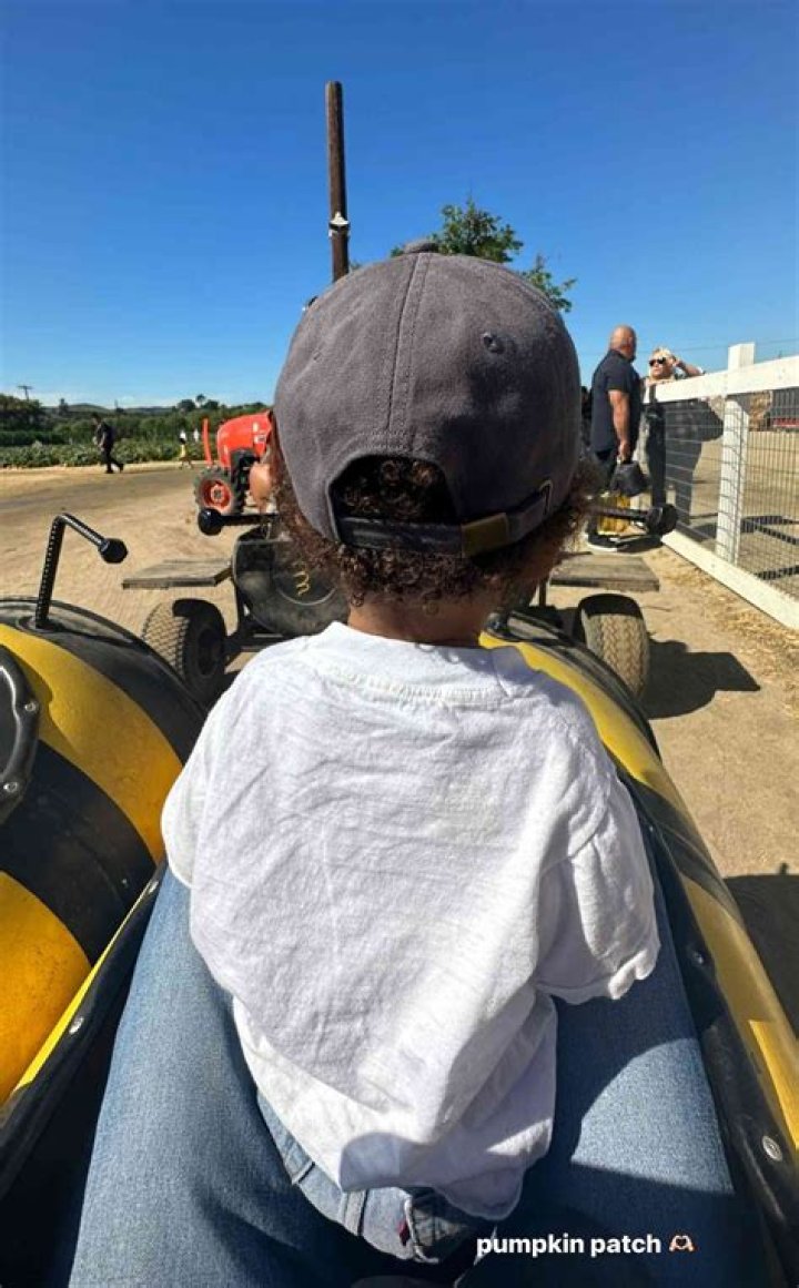 Travis Scott Dotes On Daughter Stormi, 3, As They Enjoy A Pumpkin Patch Together — Photo