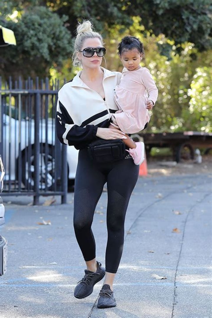 True Thompson, 2, Is The Cutest Fashionista In $1,500 Mini Louis Vuitton Bag & Fendi Combat Boots