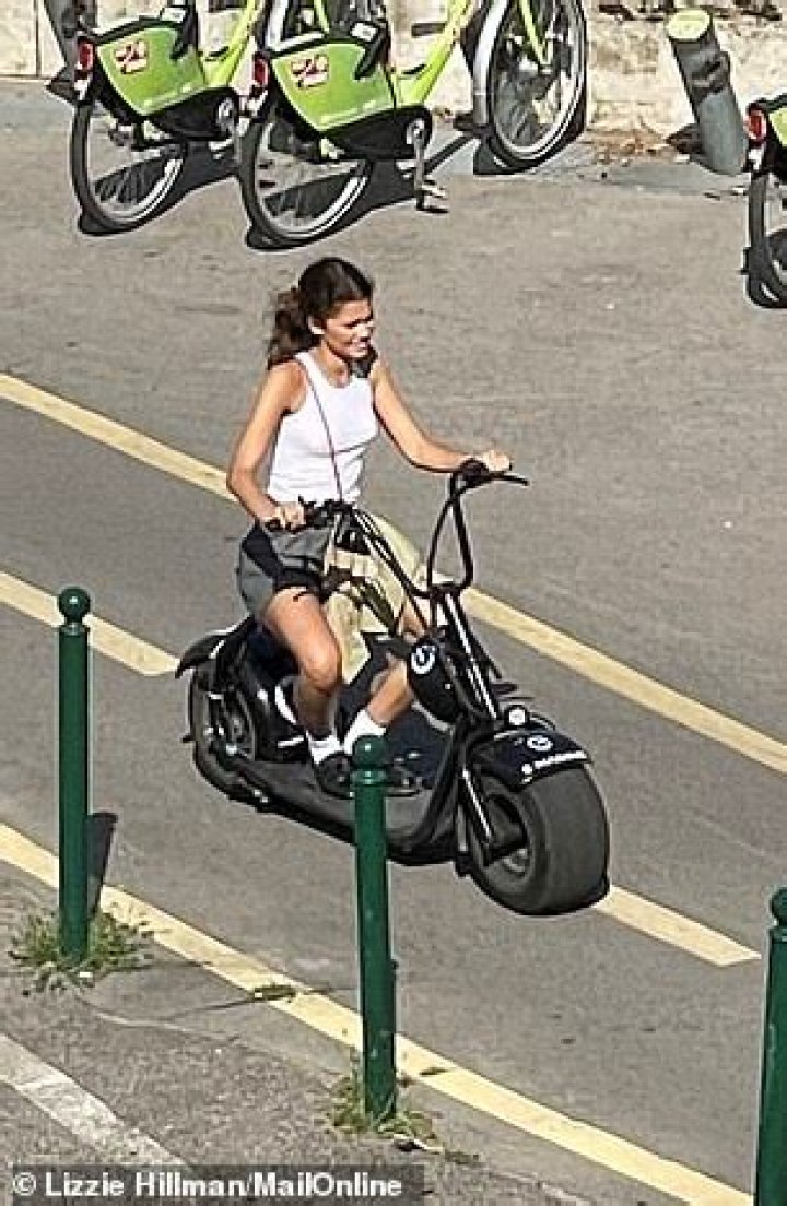 Zendaya & Tom Holland Go On Romantic Scooter Ride Around Budapest: Rare Photos